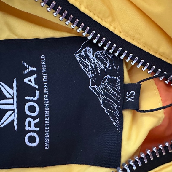 Brand new Orolay jacket in yellow. Size xs. - Picture 2 of 4